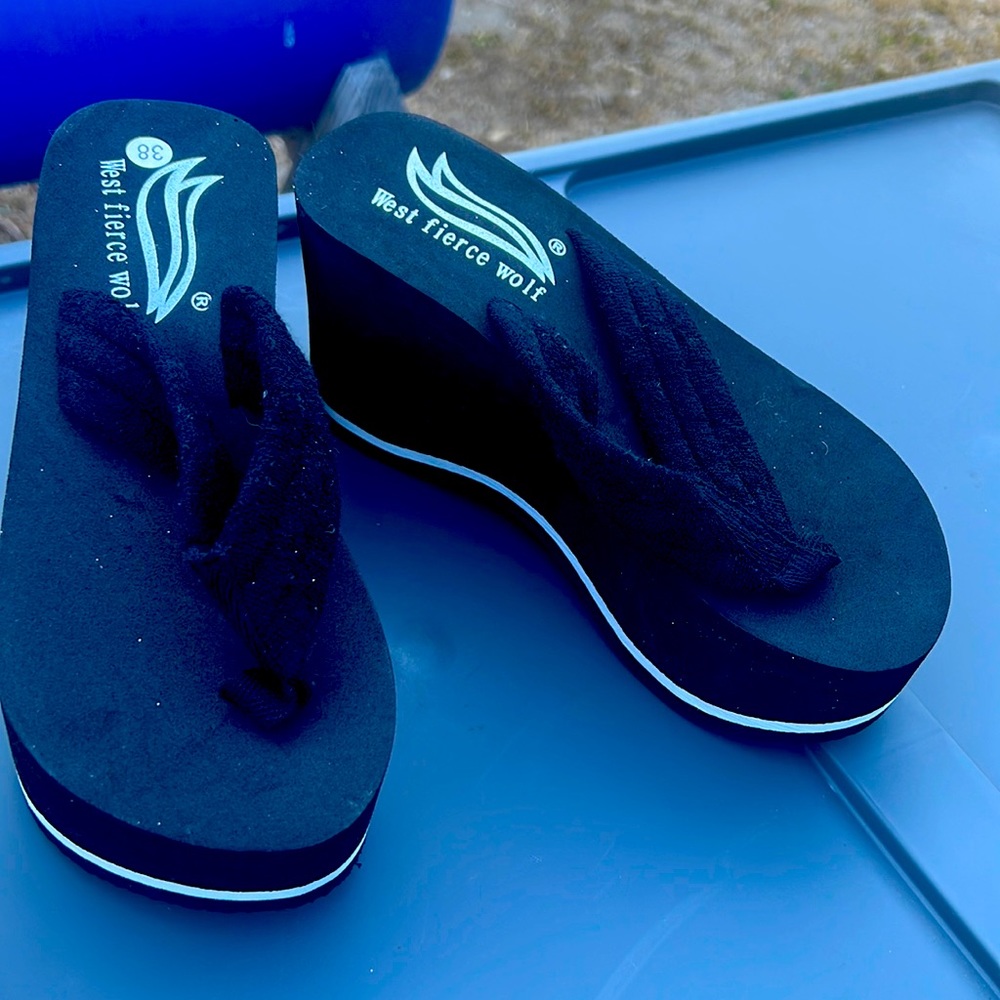 Black slipper platform.